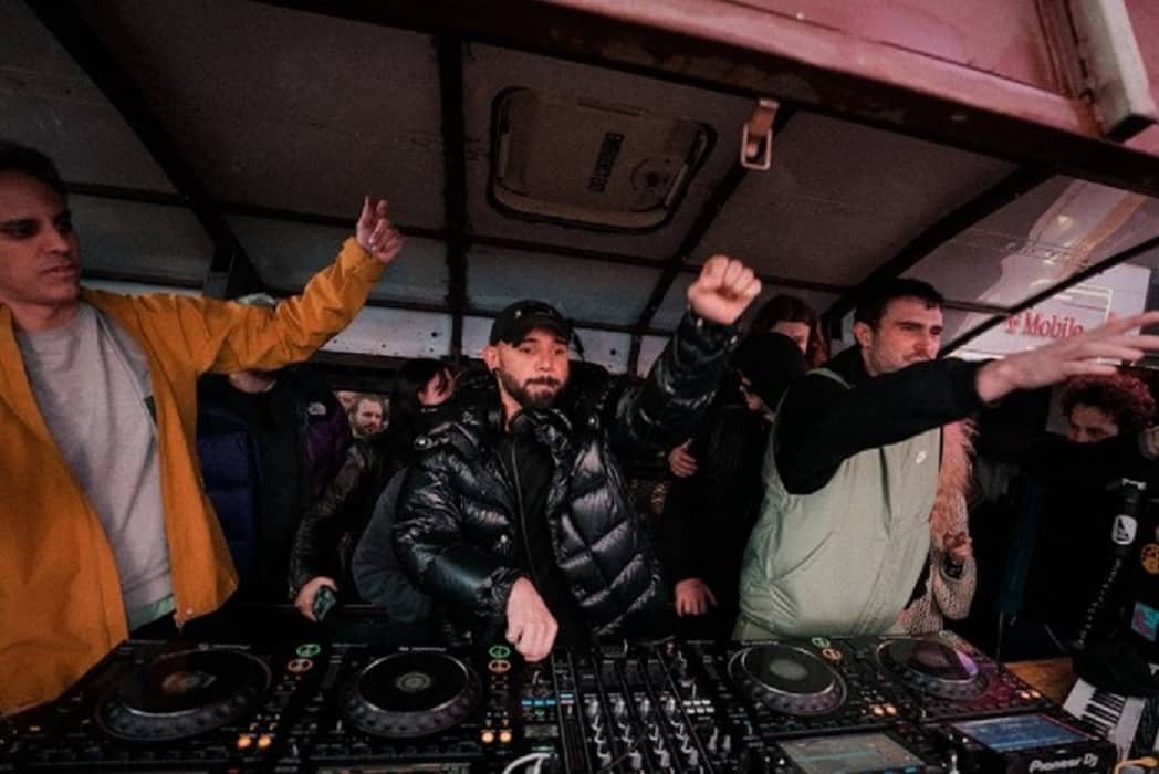 Skrillex, Fred Again.. & Four Tet play surprise set from school bus in Times Square: Watch